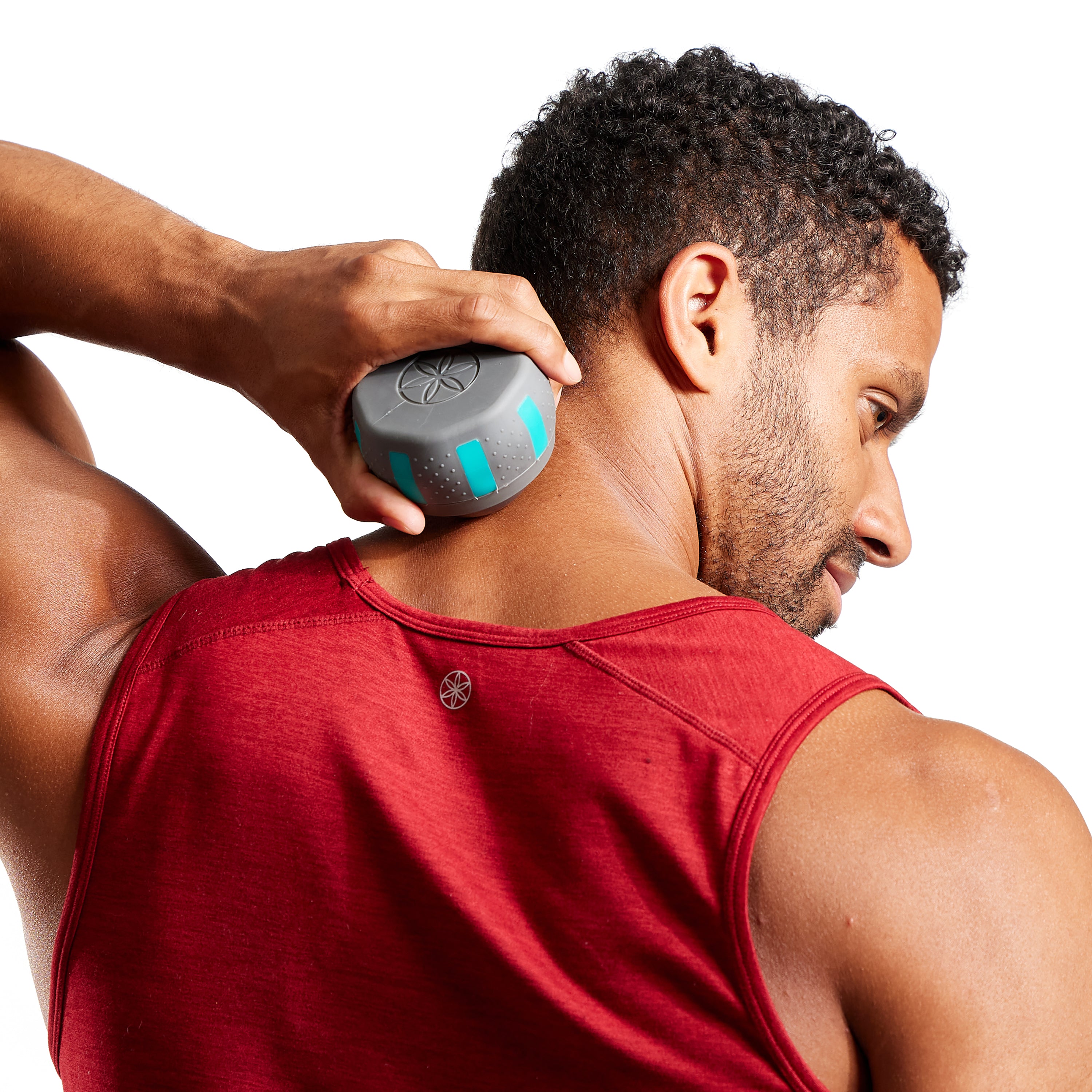 Person using the  Sure Grip Massage Roller on the back of the neck